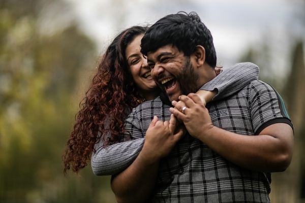 Amez gives Labib a surprise hug from behind. The couple explode into fits of giggles!